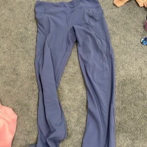 Blue pair of athleta leggings, kinda worn
